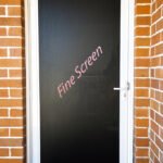 White perforated security door